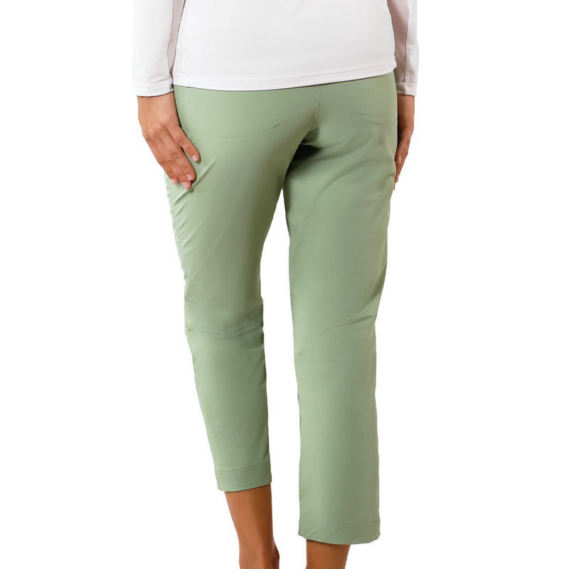 back view of woman in walking capris in sage|sage