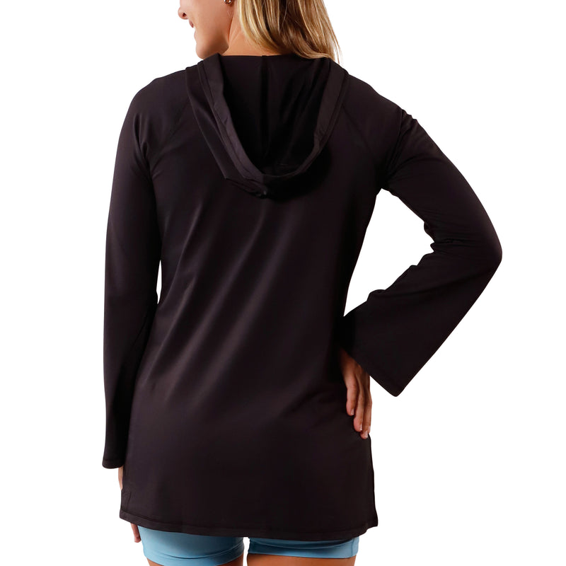 back view of Woman in UV Skinz's Women's Hooded Beach Cover Up|black