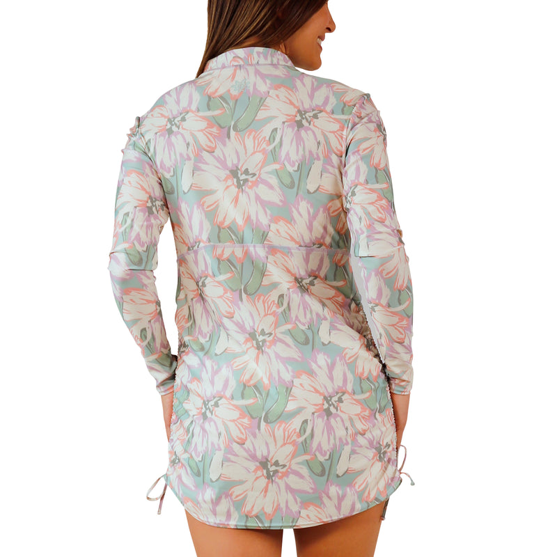 back view of woman in women's convertible swim shirtdress in aurora bloom|aurora-bloom