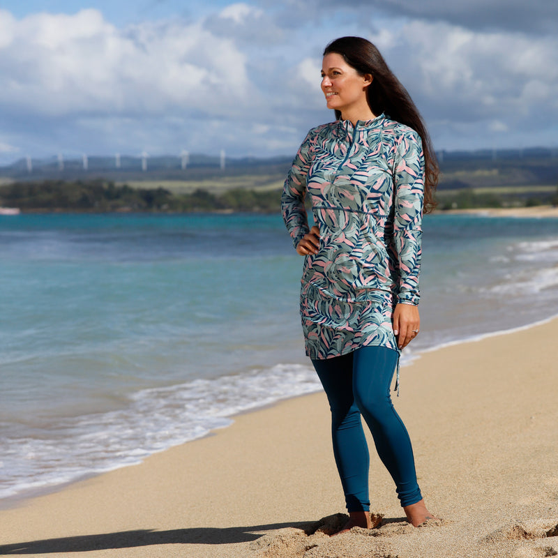 woman posing by the beach in women's convertible swim shirtdress in moonlit canopy|moonlit-canopy