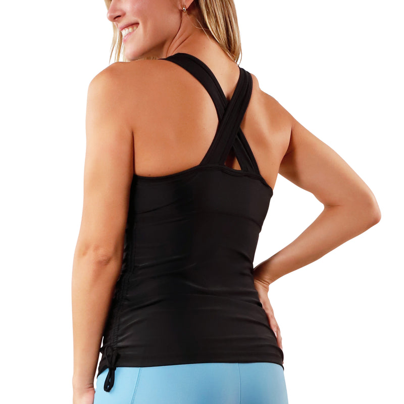 back view of Women's ruched swim tank top in black|black