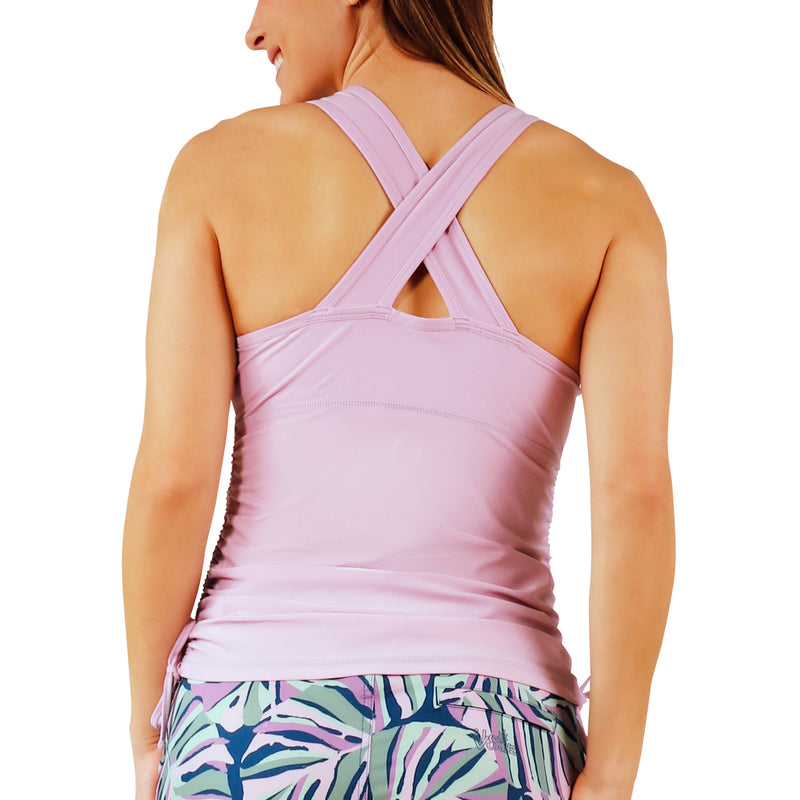 back view of woman in women's ruched scoop tank top in lotus|lotus