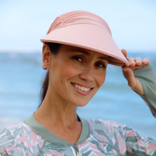 woman in dusty pink swim visor|dusty-pink