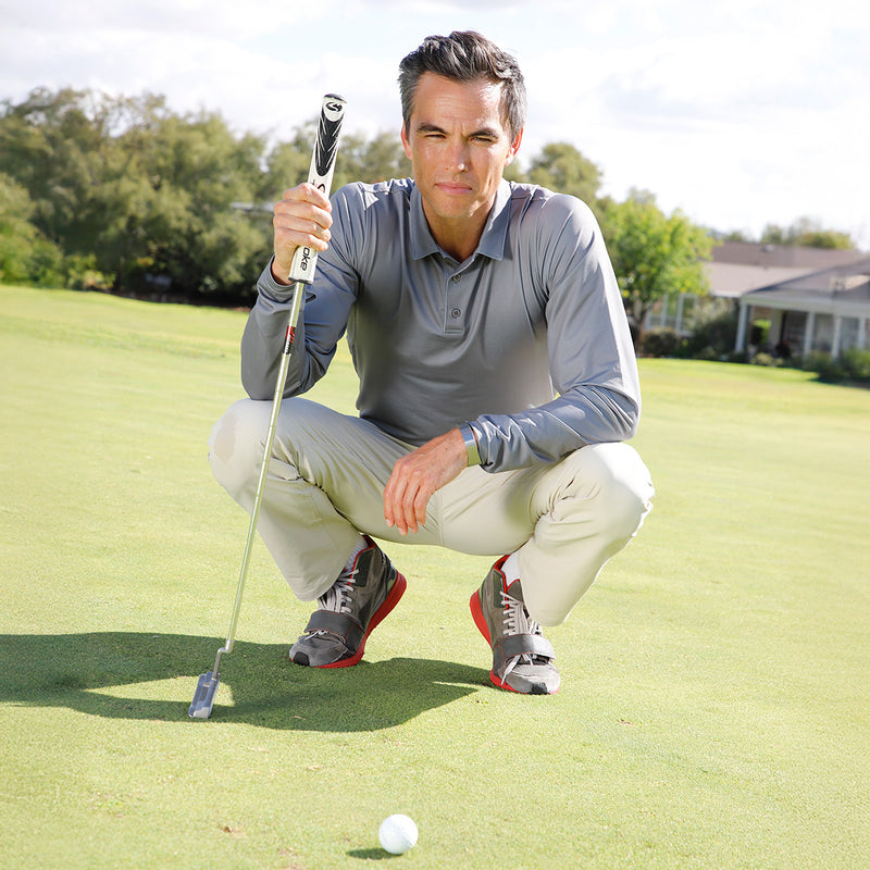 man in long sleeve performance polo in grey links|grey-links