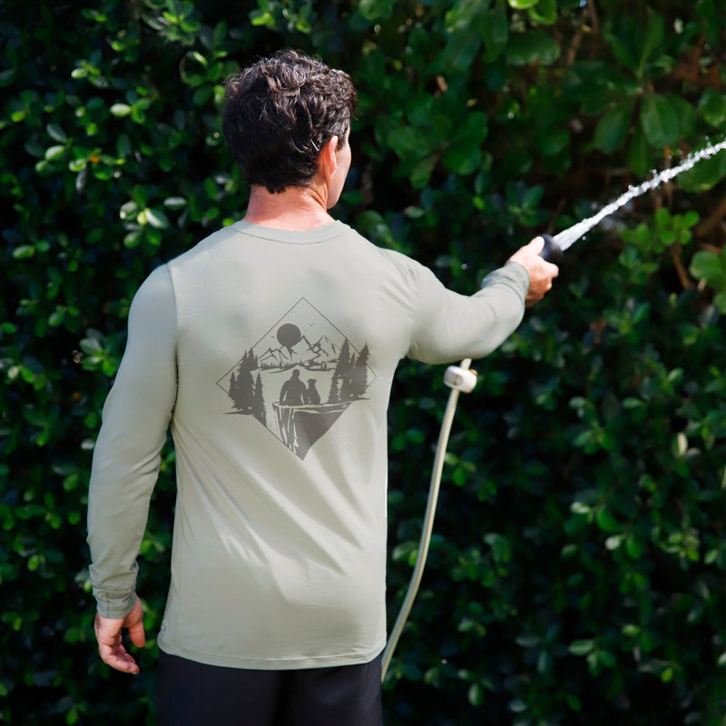 man watering his garden in men's long sleeve everyday tee|agave