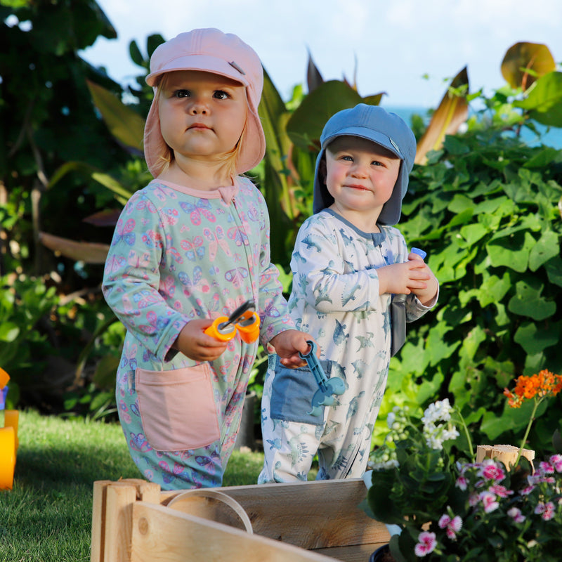 babies in everyday romper in garden in butterflies and watercolor dinos