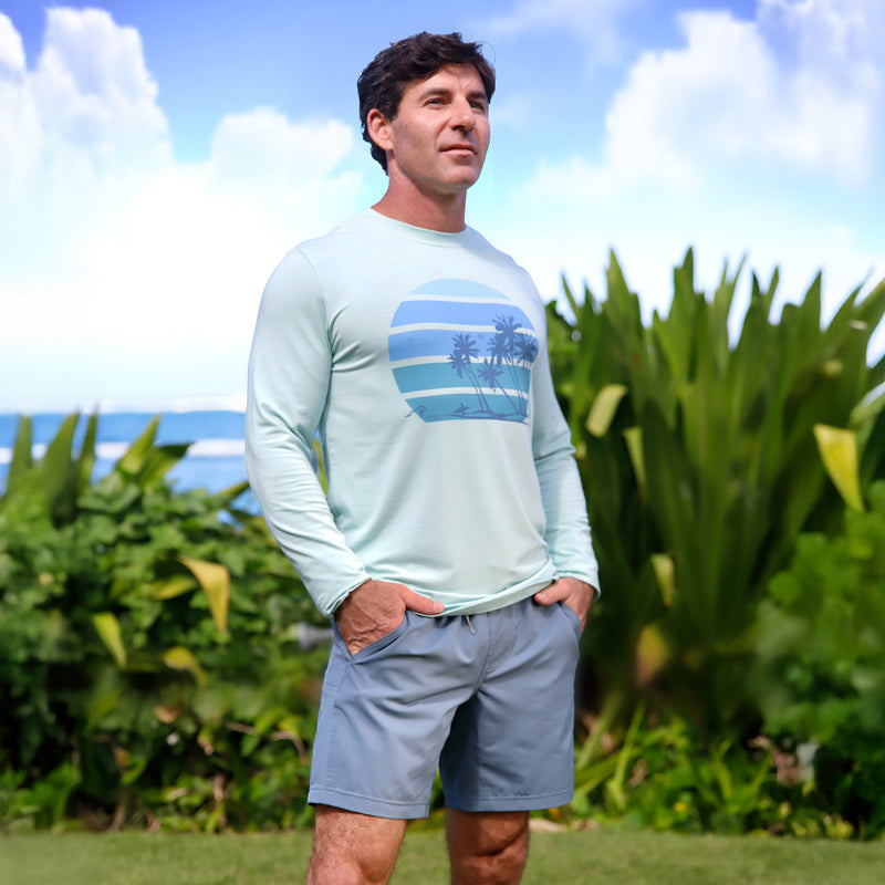 man posing in men's long sleeve everyday tee|dewdrop